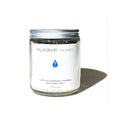By Valenti jar of wildflowers and goat's milk bath salt on a white background