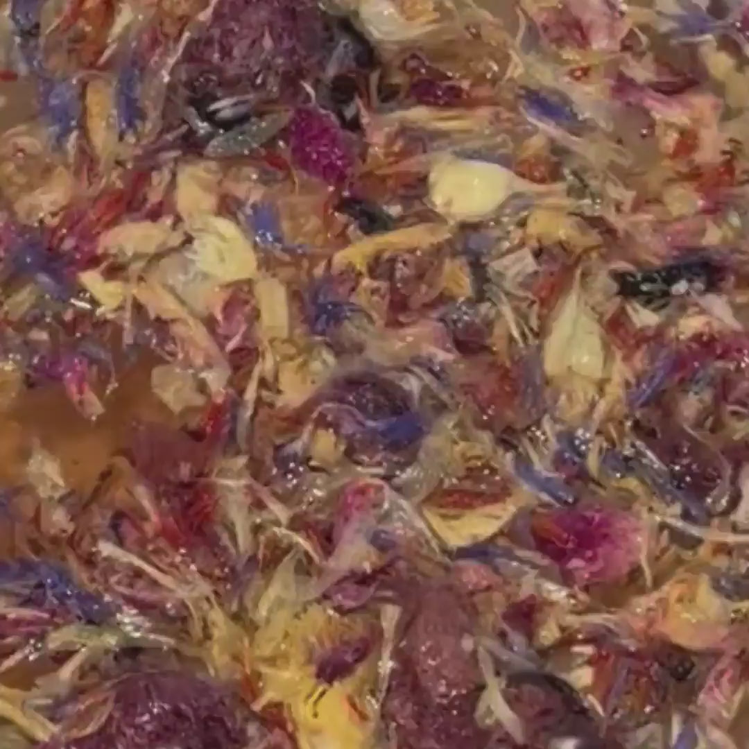 By Valenti wildflower facial tea flowers in water in movement